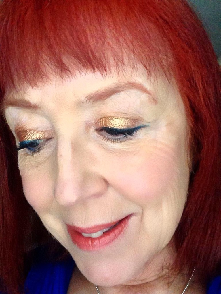eye makeup with Lorac Unzipped Gold shadow palette and essence gel eyeliner in teal