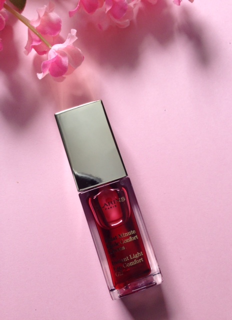 Clarins Instant Light Lip Oil , red shade 03 neversaydiebeauty.com