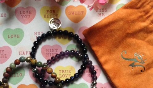 beaded Joseph Nogucci bracelets with orange suede drawstring bag neversaydiebeauty.com @redAllison