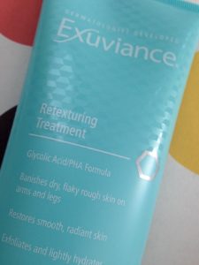 Exuviance Retexturing Treatment, closeup of benefits listed on tube neversaydiebeauty.com