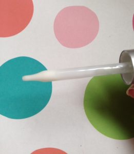 StriVectin Overnight Resurfacing Concentrate dropper showing the milky concentrate neversaydiebeauty.com