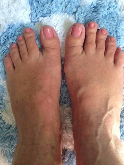 feet wearing Milani Pink Beige nail polish neversaydiebeauty.com