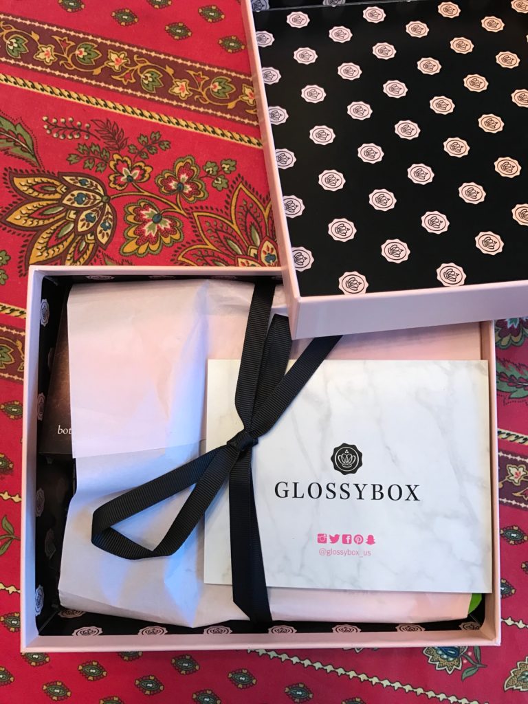 tissue paper wrapped interior of Glossybox October 2016 neversaydiebeauty.com