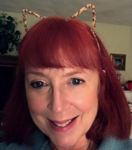 me wearing leopard ears neversaydiebeauty.com