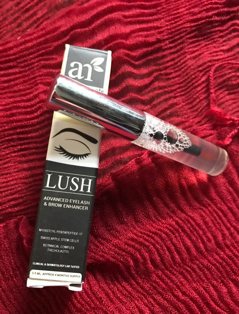 Art Naturals Lush Advanced Lash and Brow Enhancer: outer packaging and bottle with brush applicator neversaydiebeauty.com