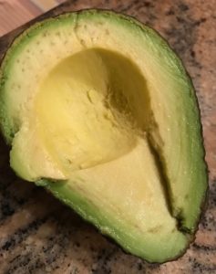 the inside of half an avocado