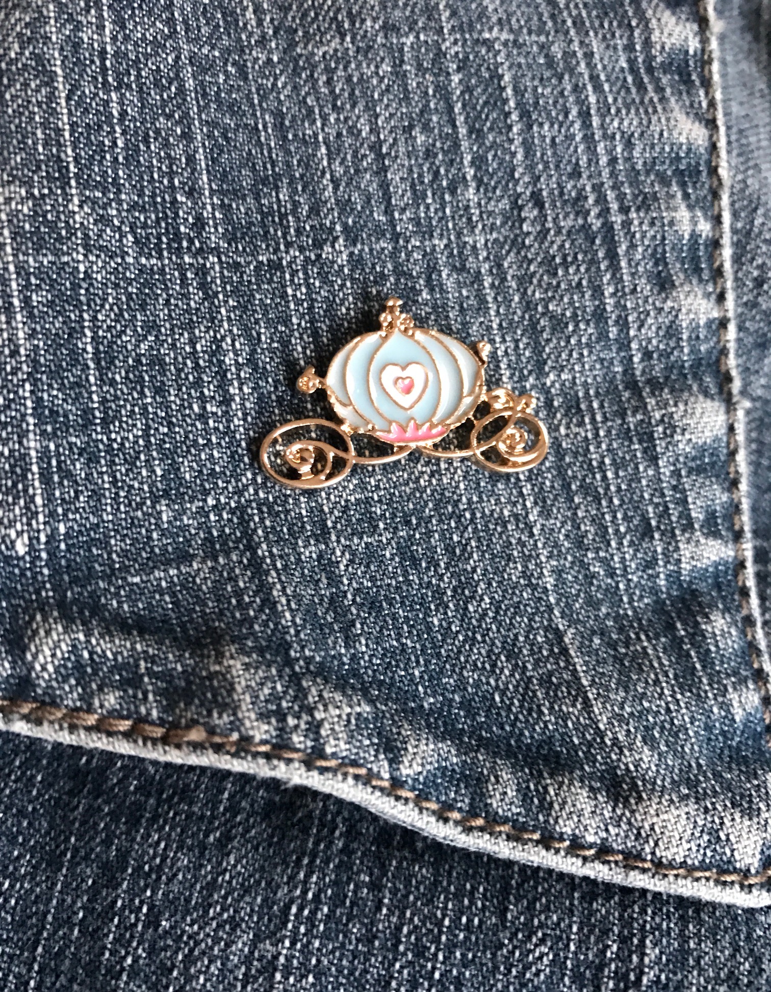 enameled pin of Cinderella's coach from Femme de Bloom, neversaydiebeauty.com