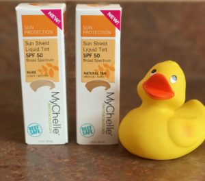 MyChelle Sun Shield Liquid Tint SPF 50 Nude and Natural Tan outer packaging, neversaydiebeauty.com