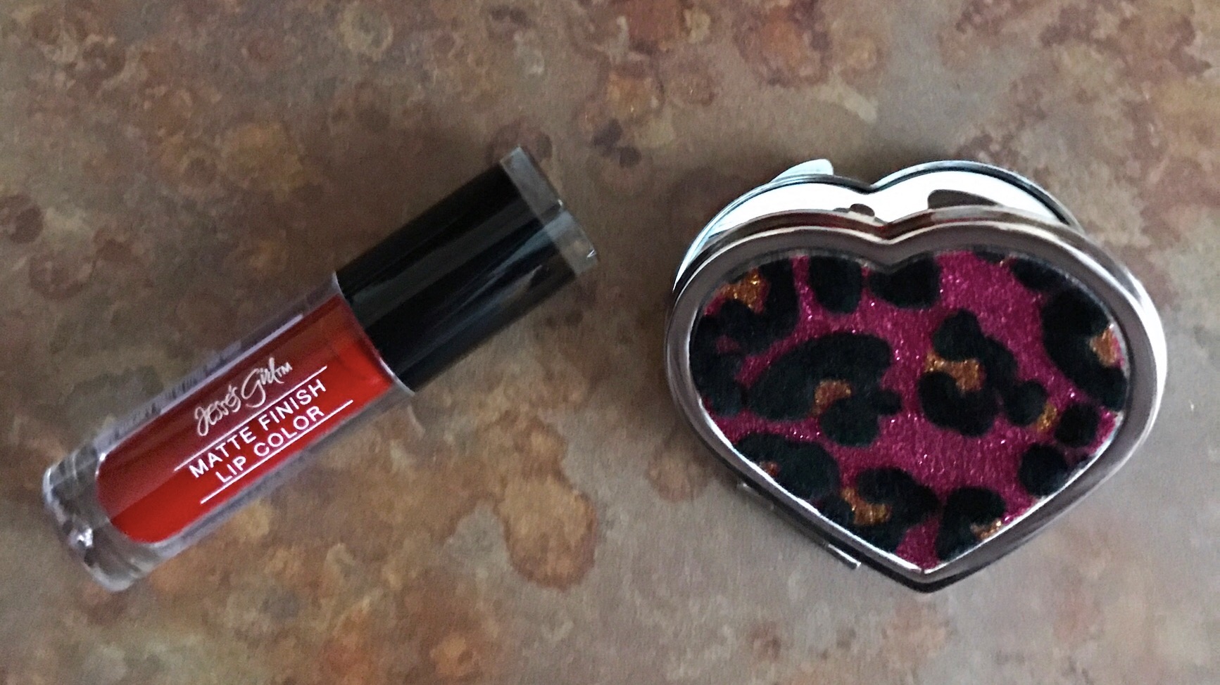 Jesse's Girl Matte Finish Lip Color, Sultry, and heart-shaped leopard print mirror, neversaydiebeauty.com