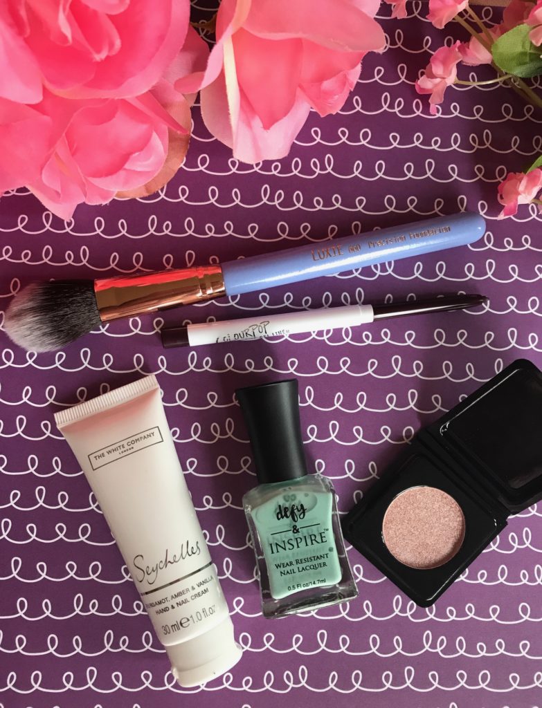 contents of my ipsy Side Show bag for April 2017 showing the shades of the makeup, neversaydiebeauty.com