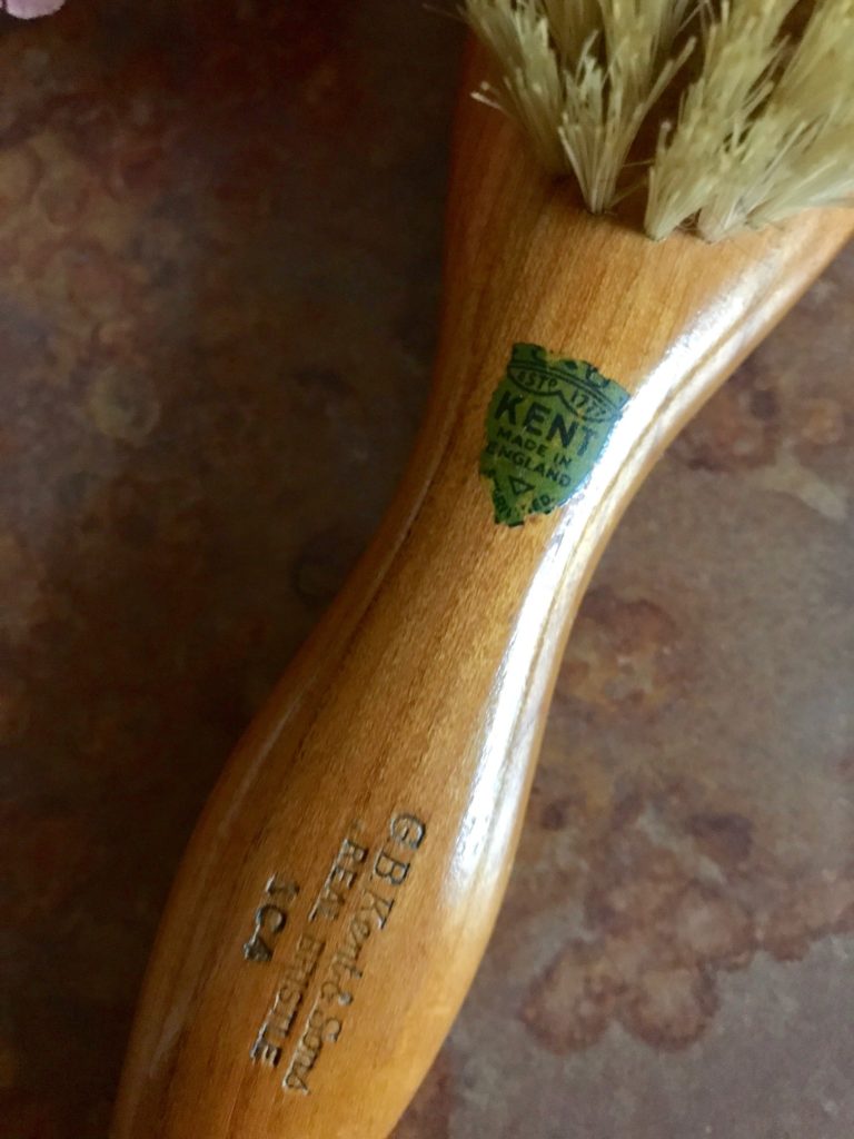 closeup of the handle of my vintage Kent of London natural bristle, wooden handle brush, neversaydiebeauty.com