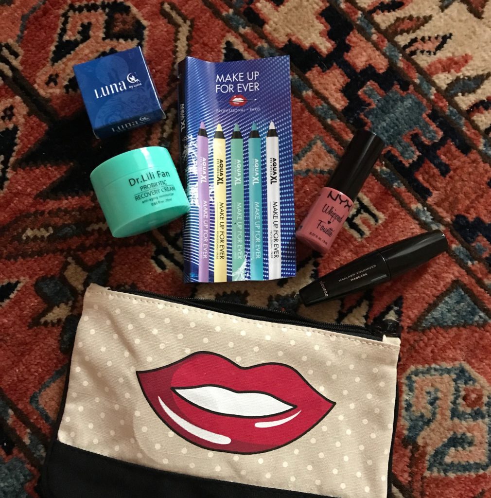 ipsy Volume Up bag and contents in its packaging for June 2017, neversaydiebeauty.com