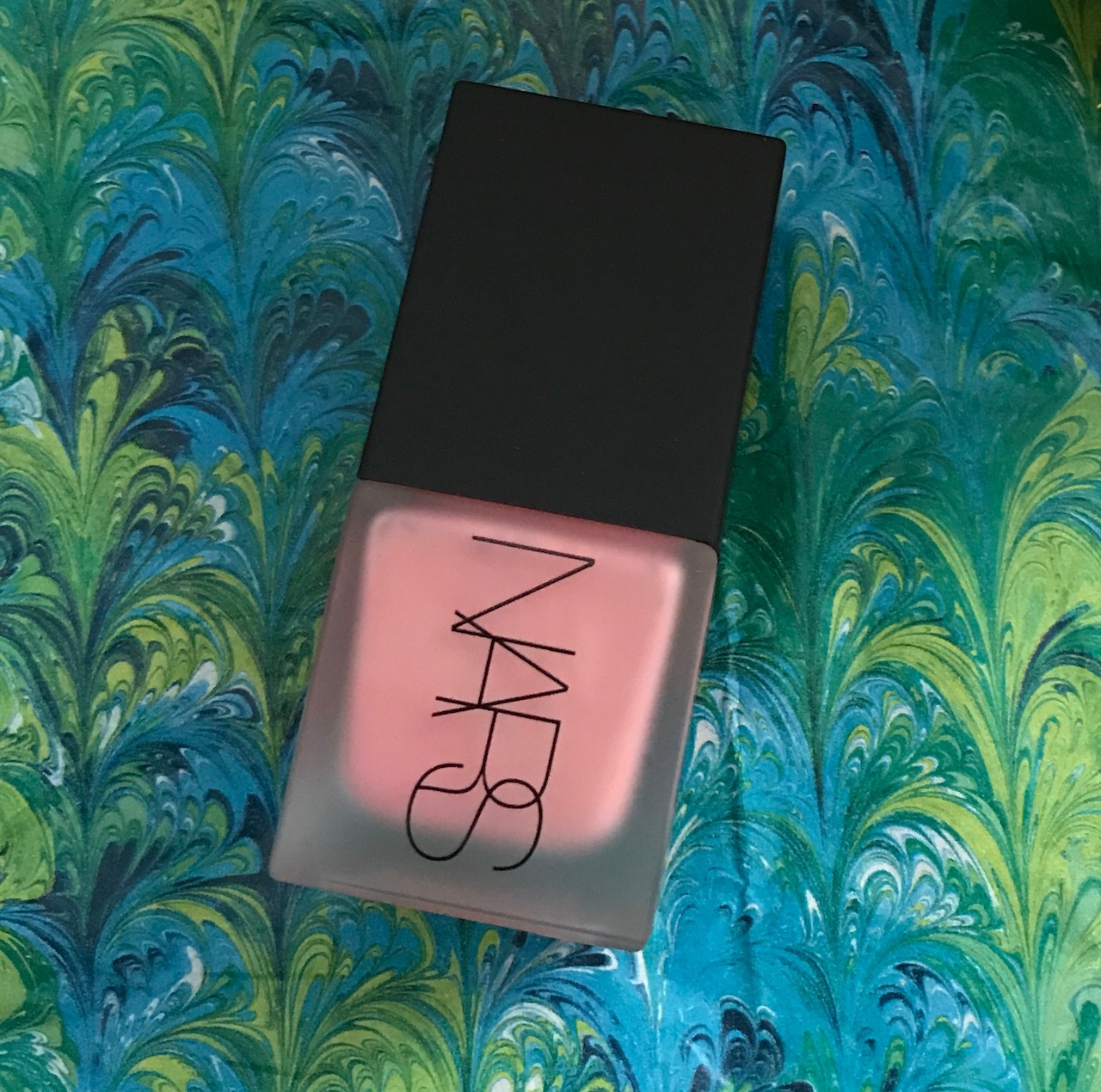 closeup of NARS Liquid Blush in shade Orgasm, neversaydiebeauty.com