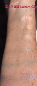 swatches Wet N Wild Rainbow Highlighter, shade Unicorn Glow, in direct sunlight, neversaydiebeauty.com