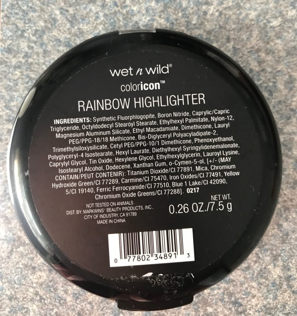 back of the compact: Wet N Wild Color Icon Rainbow Highlighter, shade Unicorn Glow, neversaydiebeauty.com