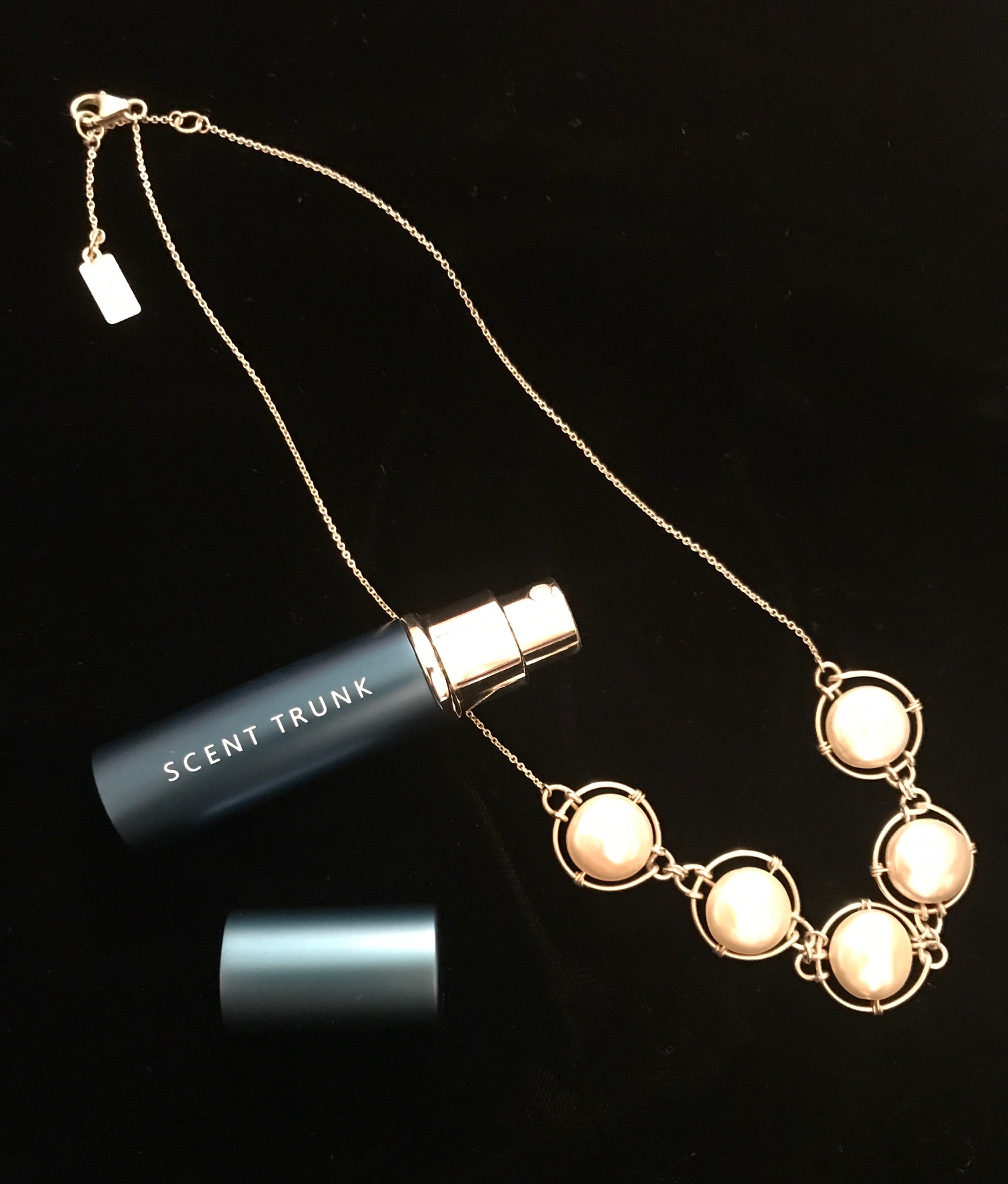 Scent Trunk fragrance atomizer with my pearl necklace, neversaydiebeauty.com