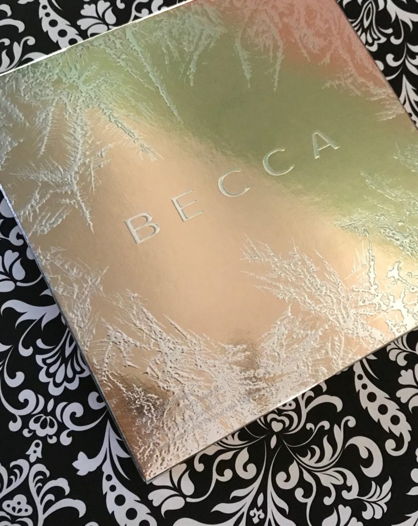 outer packaging for BECCA Apres Ski Eye Lights shadow palette, neversaydiebeauty.com
