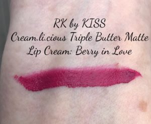 swatch of RK by KISS Cream.li.cious Triple Butter Matte Lip Cream in the raspberry shade, Berry In Love, neversaydiebeauty.com