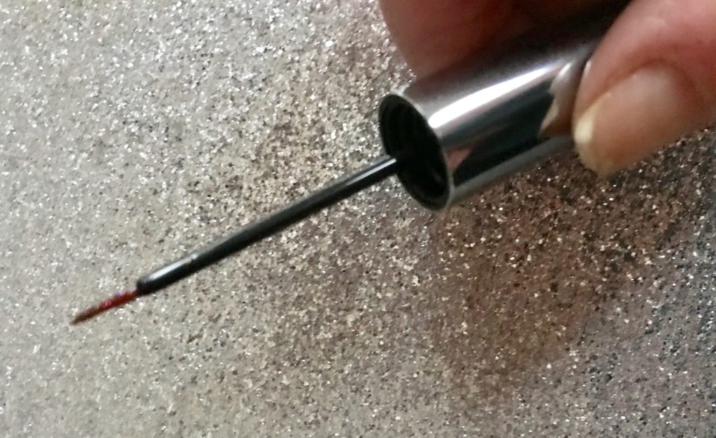 the brush for the Urban Decay Heavy Metals Glitter Liner, neversaydiebeauty.com