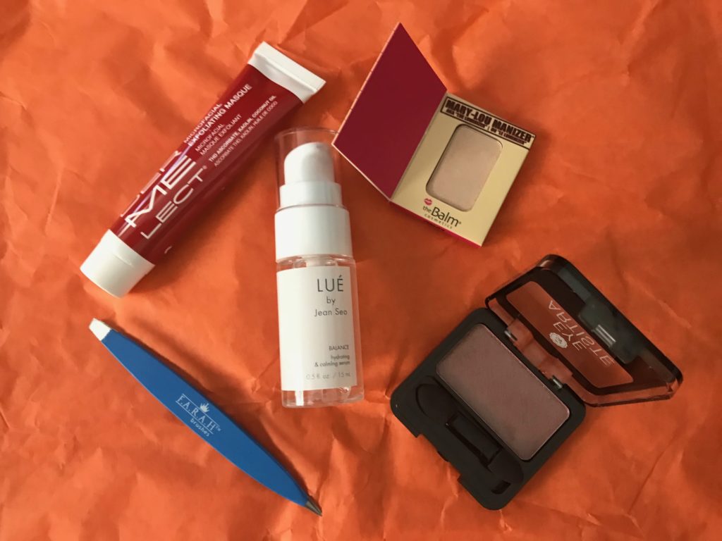 contents of my Game Face Ipsy bag for January 2018 open to show the shades and the products, neversaydiebeauty.com