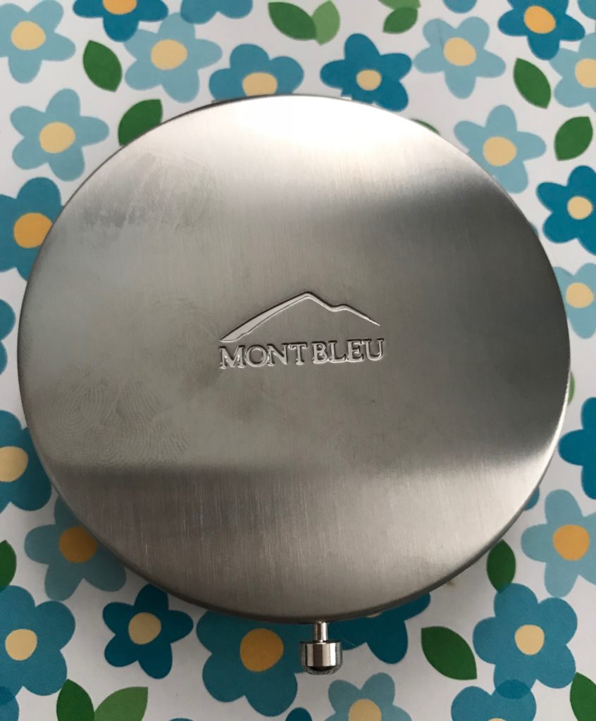 Mont Bleu logo on the back of purse mirror compact, neversaydiebeauty.com