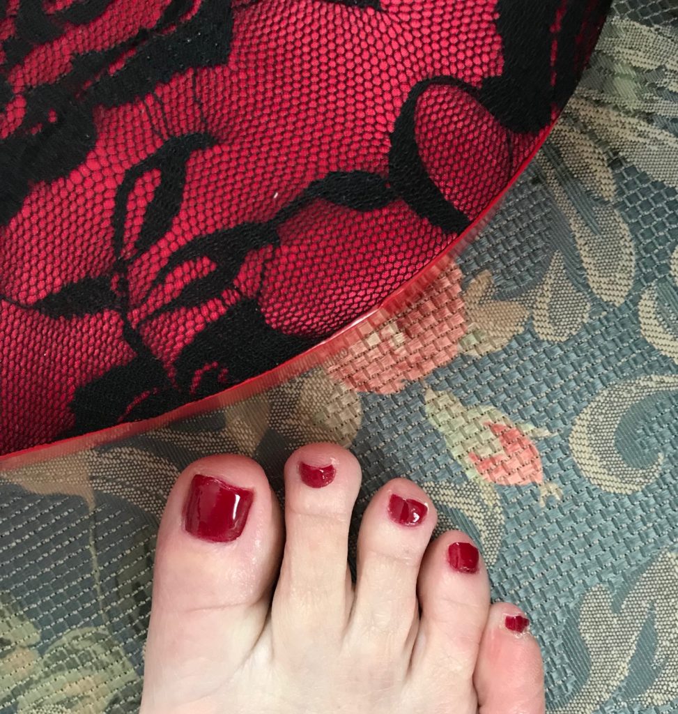 pedicure with OPI Malaga Wine nail polish, a deep red wine cream, neversaydiebeauty.com