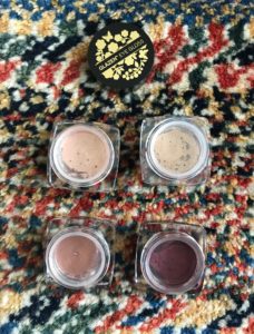 butter London Glazen Eye Gloss mini jars from the Majesty's Metal set showing the plastic top that keeps them "wet" inside, neversaydiebeauty.com