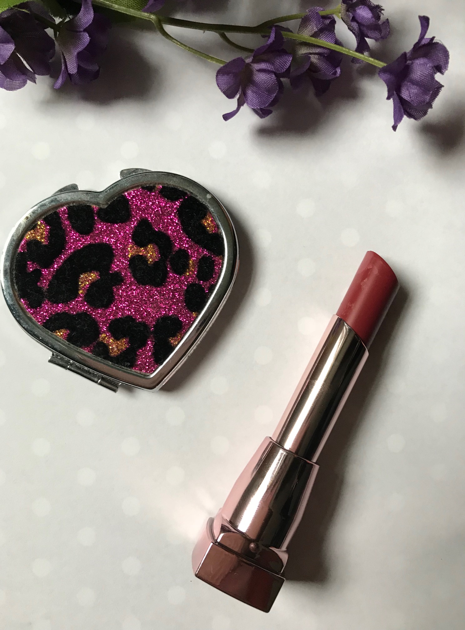 Maybelline Color Sensational lipstick in Spicy Mauve with the bullet extended to show the color, neversaydiebeauty.com