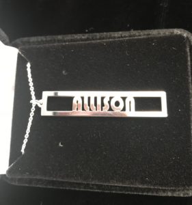 closeup of my sterling silver name necklace from Messages In Metal, neversaydiebeauty.com