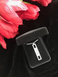 black velvet presentation box holding my name necklace from Messages In Metal, neversaydiebeauty.com