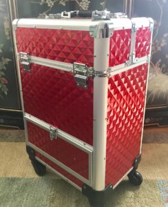 closeup of red Yaheetech train case makeup trolley, neversaydiebeauty.com