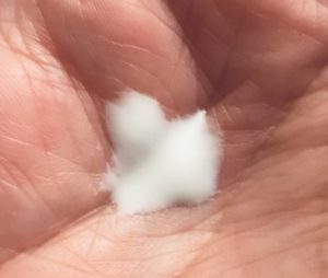 lightweight, watery Paula's Choice Youth Extending Fluid SPF 50 in my hand