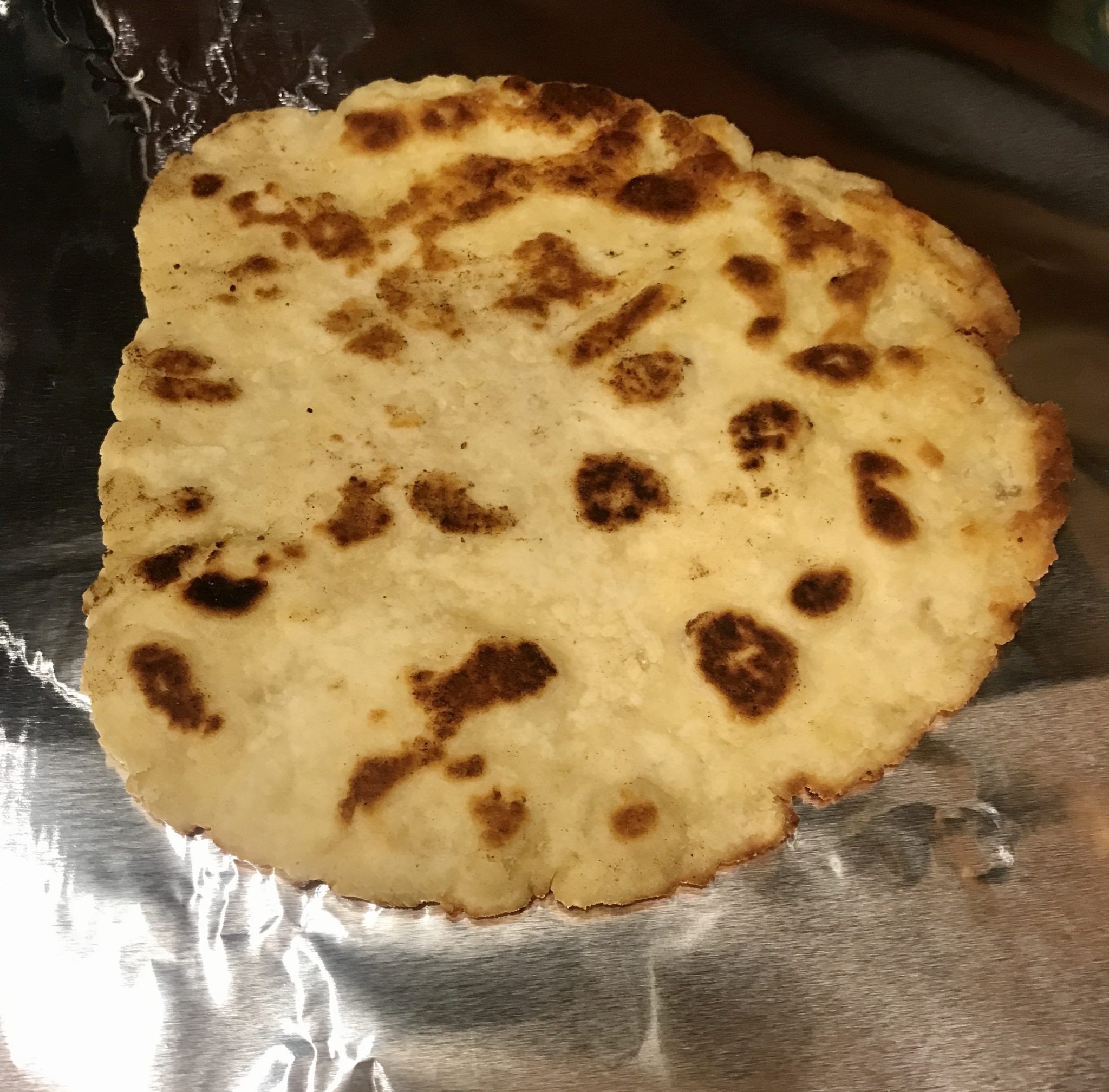 browned flatbread after it came out of the pan